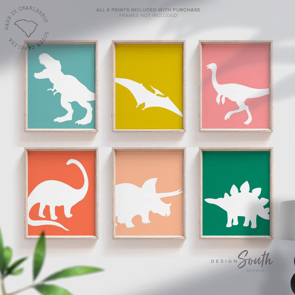 Dinosaur posters for kids and toddlers featuring a playful, retro-themed design. This wall art set includes different types of dinosaurs, perfect for a children&#39;s bedroom, playroom, or nursery. Vibrant colors and fun illustrations create an educational and decorative touch for any dinosaur-themed space. Ideal gift idea for dino-loving toddlers, helping spark their imagination and love for prehistoric creatures.