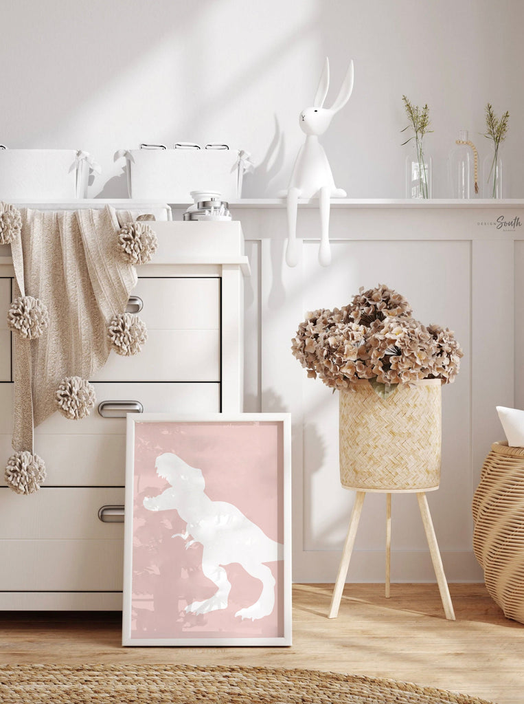 Adorable dinosaur art prints designed for a little girls room, featuring playful dinosaurs in shades of pink, teal, and purple. These vibrant and fun dinosaur illustrations are perfect for adding a touch of adventure and charm to toddler wall decor. Ideal for a girl&#39;s nursery, bedroom, or playroom, these art prints create a whimsical and colorful space. Perfect for girls who love dinosaurs, this wall decor adds personality and joy to any room setting, making it a delightful addition to her s