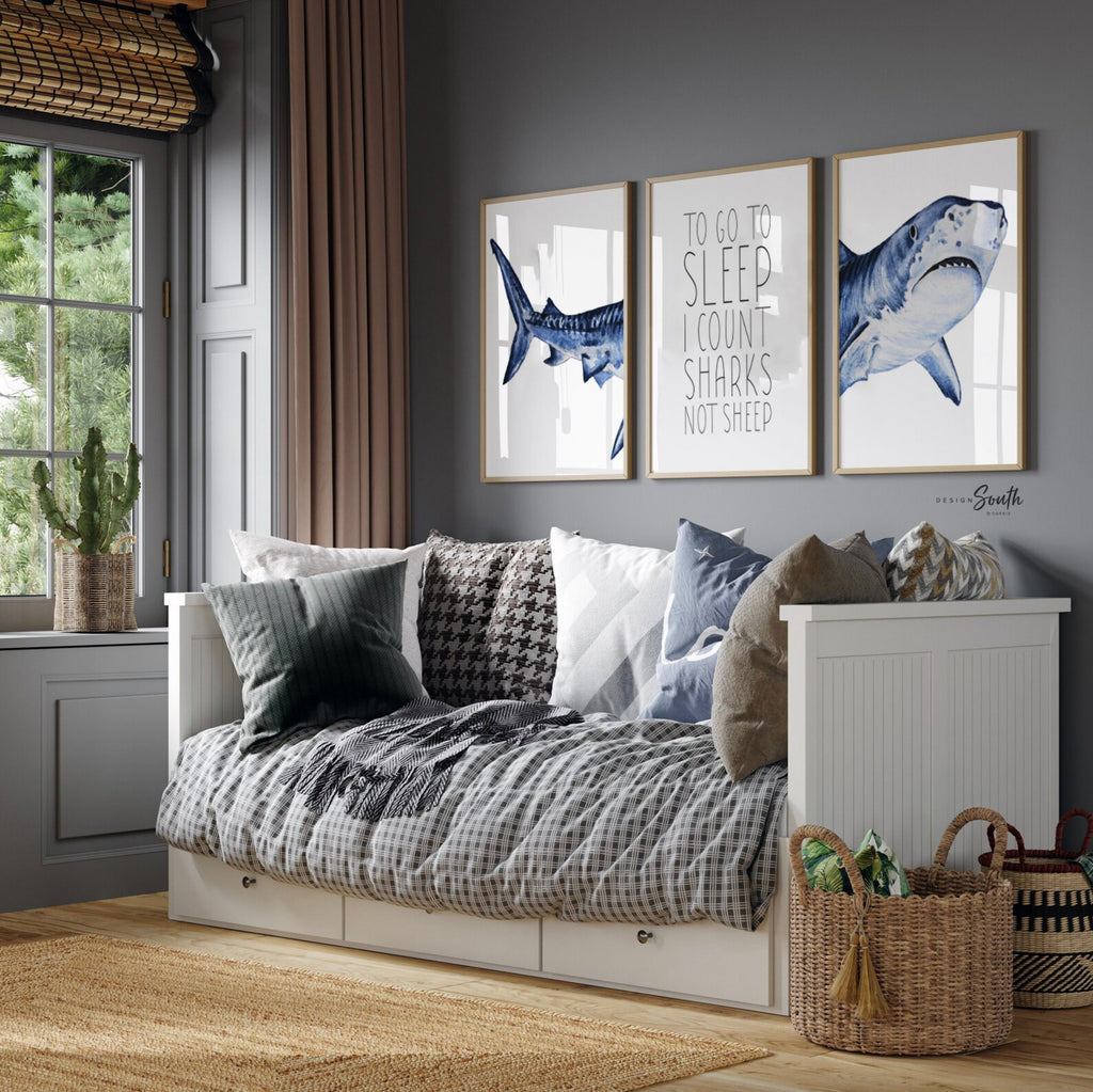 Set of shark-themed nursery wall art prints featuring the quote “To go to sleep I count sharks not sheep.” Perfect for a baby boy’s room or ocean-themed nursery, this playful and modern artwork adds a fun touch to boys&#39; bedrooms or toddler spaces. Includes watercolor-style shark illustrations and bold text, ideal for a shark lover’s room or under-the-sea decor. A great gift for baby showers, birthdays, or parents creating a shark or marine life theme for their little one.
