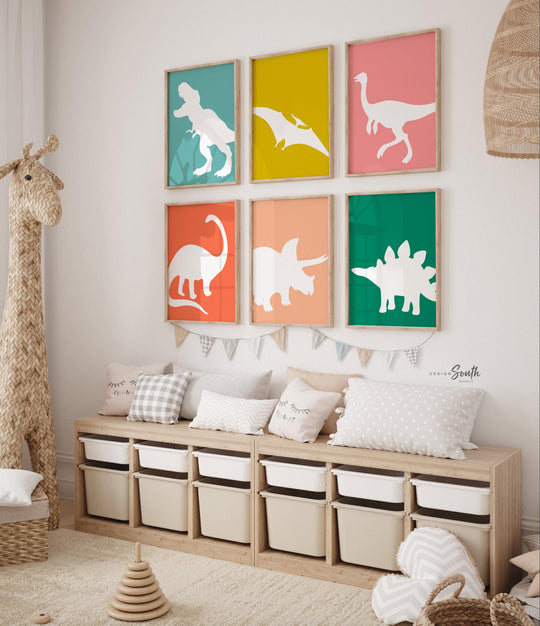 Dinosaur posters for kids and toddlers featuring a playful, retro-themed design. This wall art set includes different types of dinosaurs, perfect for a children's bedroom, playroom, or nursery. Vibrant colors and fun illustrations create an educational and decorative touch for any dinosaur-themed space. Ideal gift idea for dino-loving toddlers, helping spark their imagination and love for prehistoric creatures.