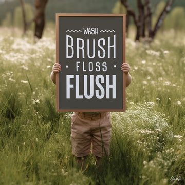 Brown and white bathroom wall art featuring the phrases &quot;wash, brush, floss, flush.&quot; Perfect for a boy’s bathroom or a gender-neutral space, this print brings a simple yet charming touch to any kids’ or guest bathroom. Great for encouraging healthy habits, this design blends well with brown and white decor themes, creating a clean, stylish look that suits both boys’ and girls’ bathrooms.