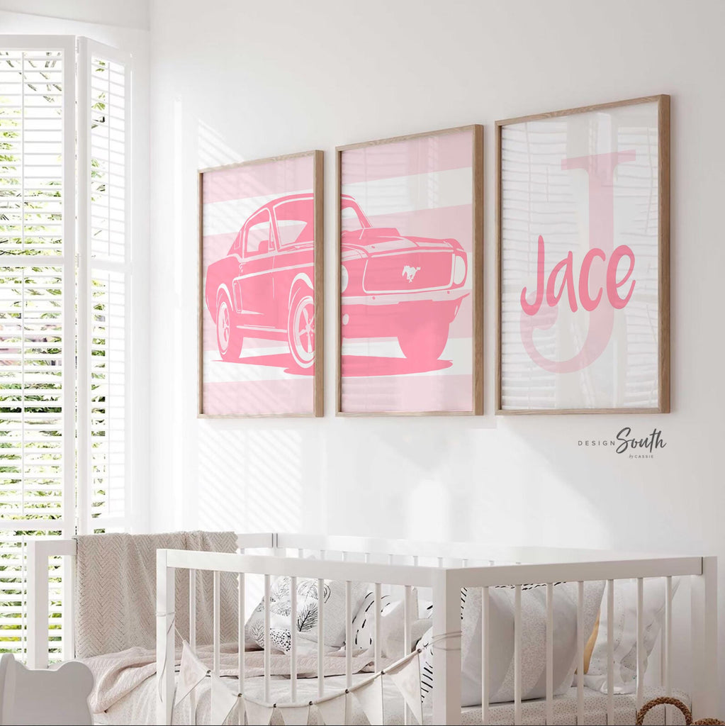 Pink Ford Mustang Shelby 1967 wall art print set designed for baby girls&#39; nurseries or toddler rooms. This set of three prints features the classic muscle car in soft pink tones, adding a fun and stylish automotive touch to any girl&#39;s space. Perfect for a personalized nursery, toddler&#39;s bedroom, or as a unique baby shower gift. The pink hues bring a playful, feminine twist to the iconic car, creating a one-of-a-kind decor piece that sparks imagination and complements modern design.