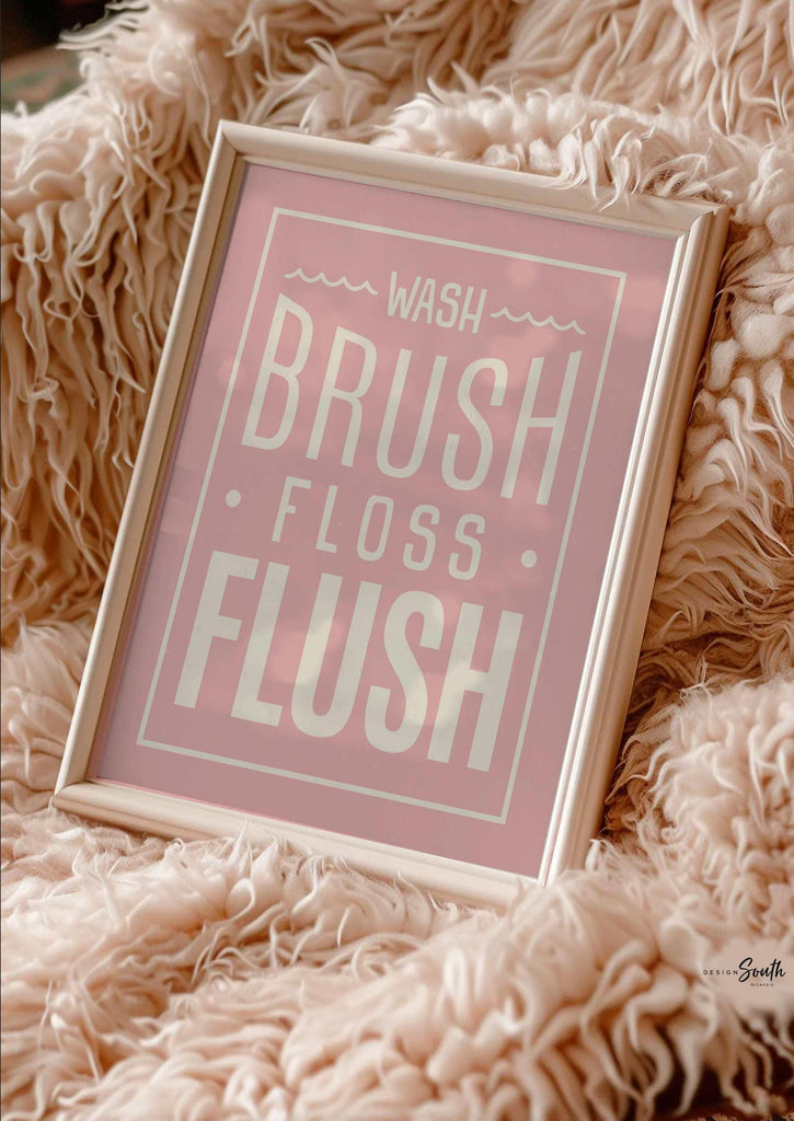 Pink bathroom wall art for girls featuring the phrases &quot;wash, brush, floss, flush&quot; in soft pink and white tones. Perfect for a girl&#39;s bathroom or powder room, this print adds a fun and feminine touch while encouraging daily hygiene routines. Ideal for children&#39;s bathroom decor, pink bathroom themes, or playful girly wall accents.