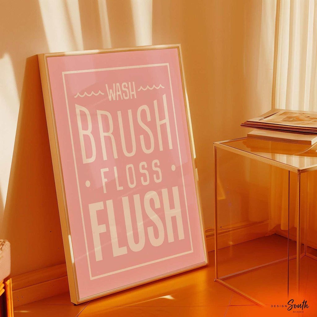 Pink bathroom wall art for girls featuring the phrases &quot;wash, brush, floss, flush&quot; in soft pink and white tones. Perfect for a girl&#39;s bathroom or powder room, this print adds a fun and feminine touch while encouraging daily hygiene routines. Ideal for children&#39;s bathroom decor, pink bathroom themes, or playful girly wall accents.