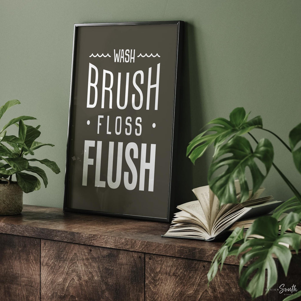 Brown and white bathroom wall art featuring the phrases &quot;wash, brush, floss, flush.&quot; Perfect for a boy’s bathroom or a gender-neutral space, this print brings a simple yet charming touch to any kids’ or guest bathroom. Great for encouraging healthy habits, this design blends well with brown and white decor themes, creating a clean, stylish look that suits both boys’ and girls’ bathrooms.