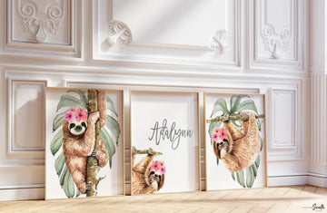 Girl sloth wall art set featuring charming sloth designs, perfect for a baby girl&#39;s nursery. This personalized sloth-themed art adds a playful and tropical touch to any girl&#39;s room decor. Ideal for creating a fun and cozy space with jungle-inspired sloth illustrations. Great for sloth nursery ideas for girls, this wall art can be customized with the girl&#39;s name for a unique and personal feel. Perfect for baby showers, birthdays, or new nursery decorations.