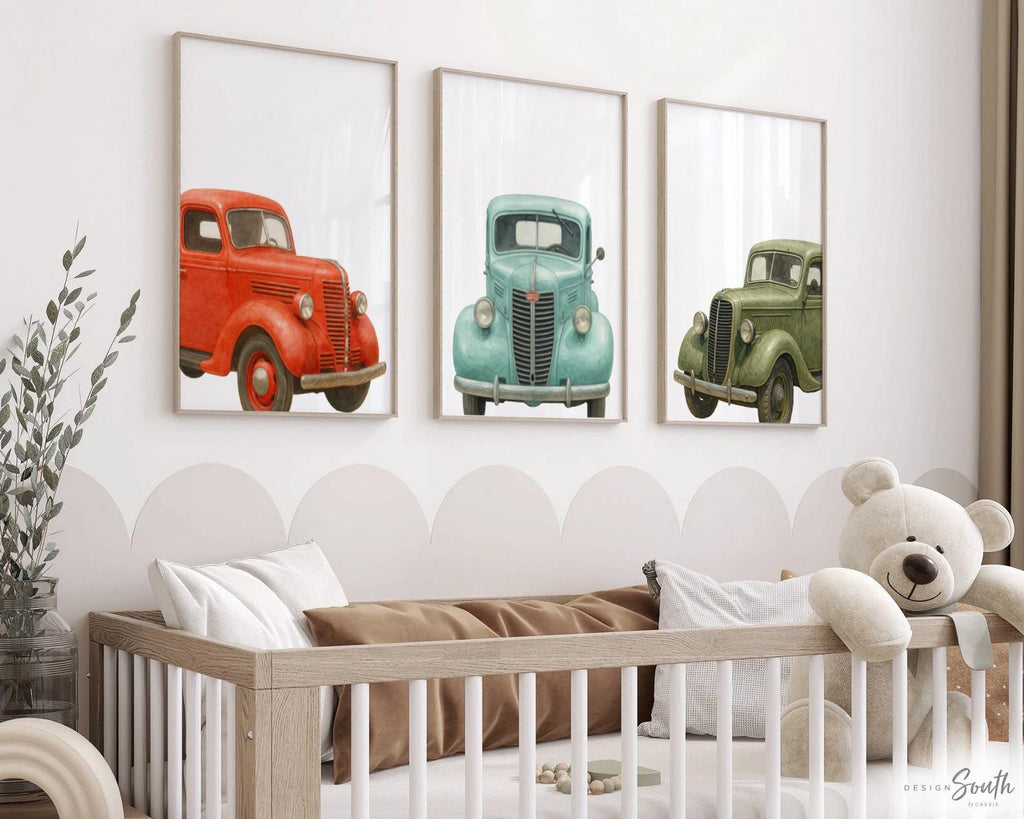 Vintage truck wall art set featuring beautifully illustrated 1930s trucks in red, green, and blue watercolor, perfect for boys nursery or toddler room decor. This charming collection of classic vehicle prints adds a timeless and playful touch to kids&#39; spaces, playrooms, or transportation-themed bedrooms. Ideal for truck-loving little ones, these high-quality prints bring color, character, and vintage style to any child’s wall.