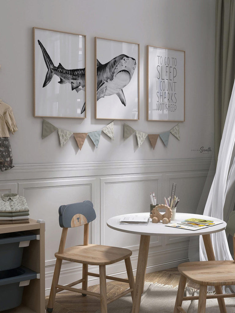 Set of shark-themed nursery wall art prints featuring the quote “To go to sleep I count sharks not sheep.” Perfect for a baby boy’s room or ocean-themed nursery, this playful and modern artwork adds a fun touch to boys&#39; bedrooms or toddler spaces. Includes watercolor-style shark illustrations and bold text, ideal for a shark lover’s room or under-the-sea decor. A great gift for baby showers, birthdays, or parents creating a shark or marine life theme for their little one.