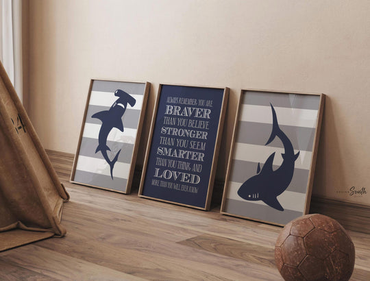 Navy blue and gray shark-themed wall art perfect for boys' bedrooms, toddler rooms, or shark nurseries. This boys room decor features fun shark illustrations and a bold quote, adding a playful and modern touch to any big boy bedroom or ocean-themed space. Ideal for kids who love sharks, this artwork set makes a great gift for birthdays, baby showers, or nursery makeovers. Designed to complement shark decor, it adds personality and charm to any boys wall art collection.