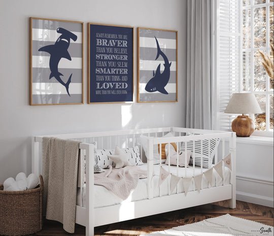 Navy blue and gray shark-themed wall art perfect for boys' bedrooms, toddler rooms, or shark nurseries. This boys room decor features fun shark illustrations and a bold quote, adding a playful and modern touch to any big boy bedroom or ocean-themed space. Ideal for kids who love sharks, this artwork set makes a great gift for birthdays, baby showers, or nursery makeovers. Designed to complement shark decor, it adds personality and charm to any boys wall art collection.