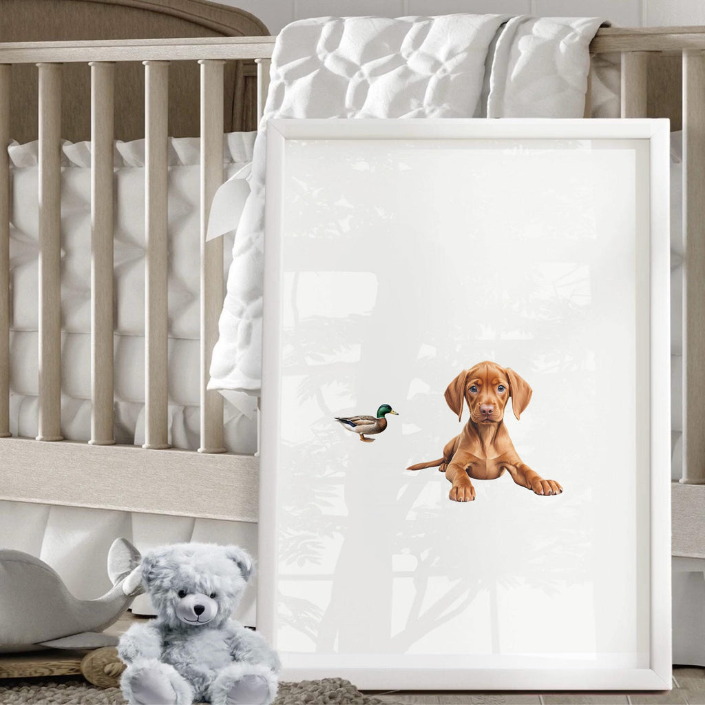 Set of 3 nursery art prints featuring Hungarian vizsla puppies accented with mallard duck birds. Designed in a soft, clean, and modern style, this sweet wall art set is perfect for a baby boy&#39;s nursery or toddler bedroom. The gentle color palette and simple composition create a calming and adorable atmosphere, ideal for dog lovers and parents looking to add a personalized, heartwarming touch to their child’s space.
