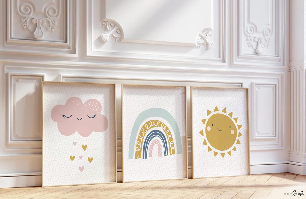 Set of 3 pastel nursery wall art prints featuring a sun, rainbow, cloud, and raining hearts design, perfect for a baby girl’s room, playroom, or toddler bedroom. These sweet and cheerful prints in soft pink, yellow, blue, and lavender tones add a whimsical and calming touch to any child’s space. Ideal for pastel-themed nurseries or rainbow baby gifts, this artwork set brings warmth and charm to your little one’s walls. A lovely decor choice for baby showers or first birthdays.