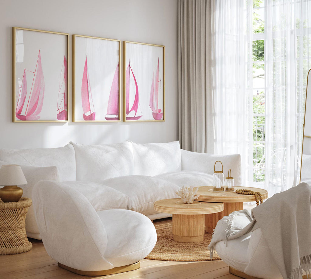 Set of 3 pink sailboat watercolor art prints featuring soft coastal scenes with ocean and lake views. These nautical wall decor pieces are perfect for a beach house, lake house, coastal bathroom, or a girl’s ocean-themed nursery. The soothing pastel tones and feminine sailing details create a light, breezy atmosphere. Ideal gift for those who love the coast, sailing, or soft pink decor. Unframed prints available in multiple sizes for versatile styling and easy framing.