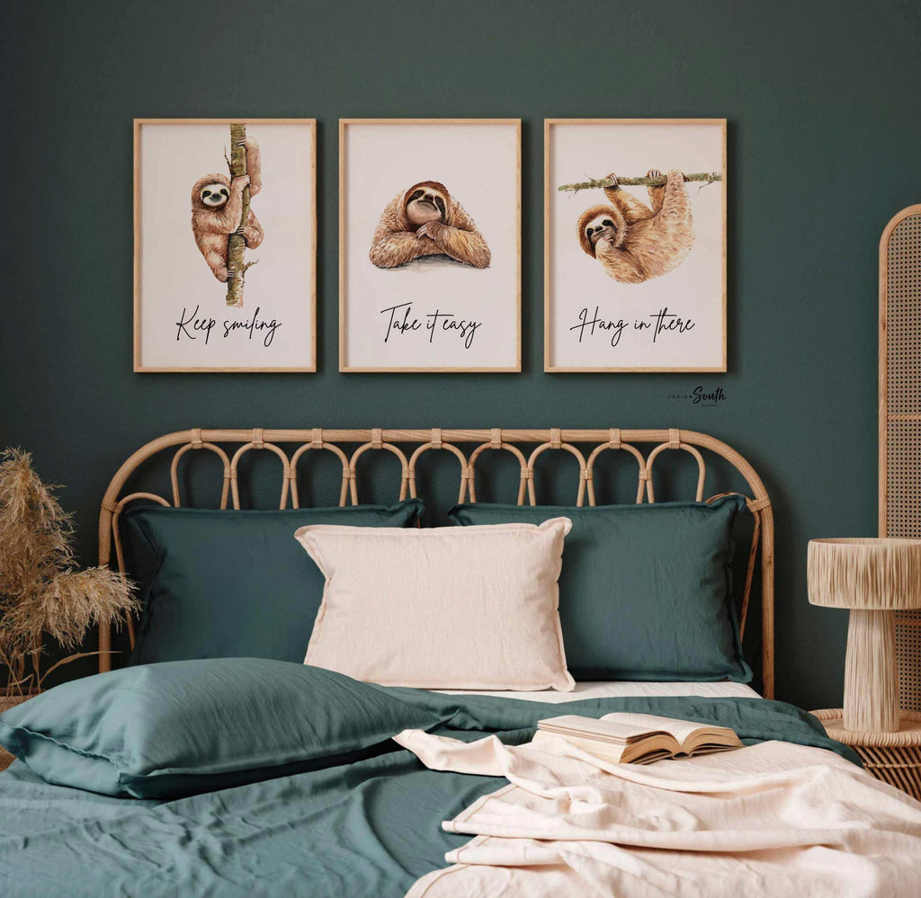 Sloth wall art set featuring 3 adorable sloth prints with inspirational quotes, perfect for a child’s bedroom or sloth-themed room. These playful and calming designs showcase hanging sloths in charming poses, adding a whimsical and relaxing vibe to nursery or kids' room decor. Ideal for sloth lovers, this wall art brings a sense of peace and fun, making it a sweet and cozy addition to any child’s space.









