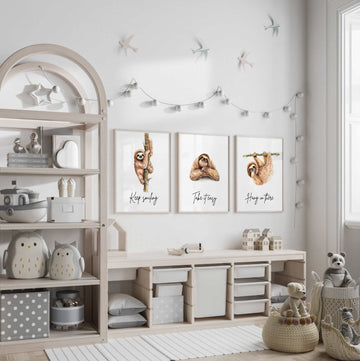 Sloth wall art set featuring 3 adorable sloth prints with inspirational quotes, perfect for a child’s bedroom or sloth-themed room. These playful and calming designs showcase hanging sloths in charming poses, adding a whimsical and relaxing vibe to nursery or kids' room decor. Ideal for sloth lovers, this wall art brings a sense of peace and fun, making it a sweet and cozy addition to any child’s space.








