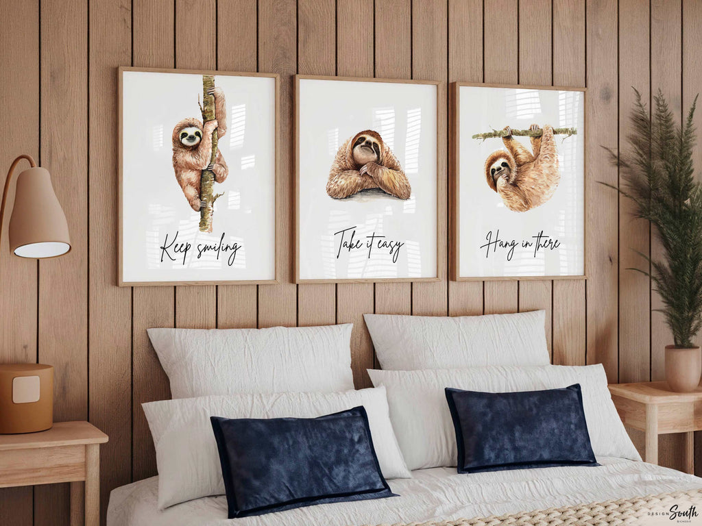 Sloth wall art set featuring 3 adorable sloth prints with inspirational quotes, perfect for a child’s bedroom or sloth-themed room. These playful and calming designs showcase hanging sloths in charming poses, adding a whimsical and relaxing vibe to nursery or kids' room decor. Ideal for sloth lovers, this wall art brings a sense of peace and fun, making it a sweet and cozy addition to any child’s space.








